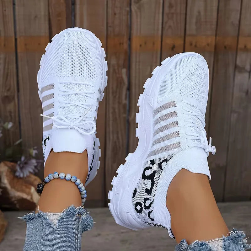 Lage sneaker met leopard print