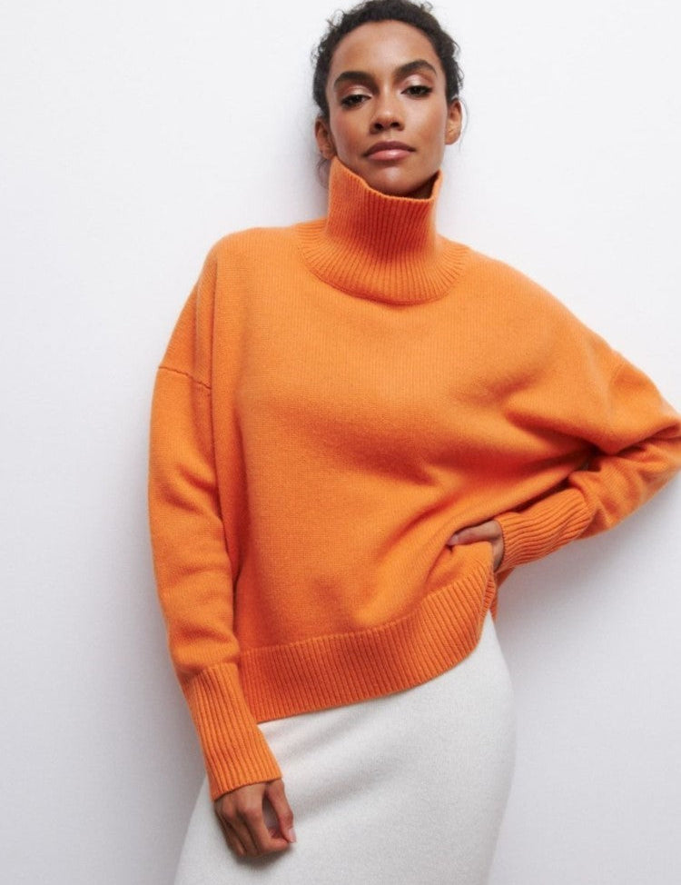 Dikke Coltrui met split in de kleur Oranje voor dames in stijl ideaal voor de herfst.