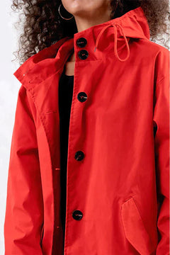 Dry | Waterdichte regenjas met knopen en capuchon in de kleur Beige voor dames in Outdoor stijl ideaal voor de herfst.