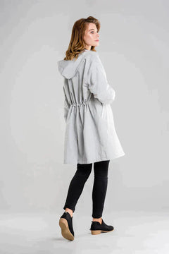 Dry | Waterdichte regenjas met knopen en capuchon in de kleur Beige voor dames in Outdoor stijl ideaal voor de herfst.