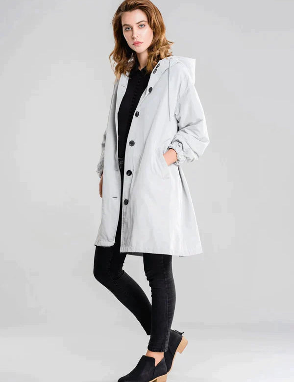 Dry | Waterdichte regenjas met knopen en capuchon in de kleur Grijs voor dames in Outdoor stijl ideaal voor de herfst.