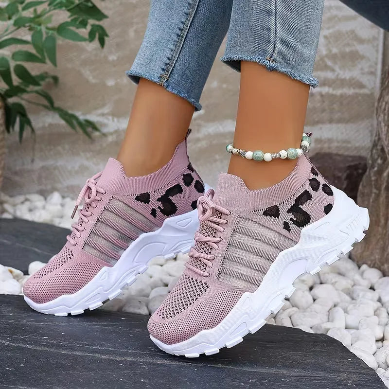 Lage sneaker met leopard print