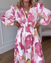 Elegante bedrukte maxi jurk met lange mouwen en V-hals in de kleur Roze voor dames in stijl ideaal voor de herfst.