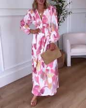 Elegante bedrukte maxi jurk met lange mouwen en V-hals in de kleur Roze voor dames in stijl ideaal voor de herfst.