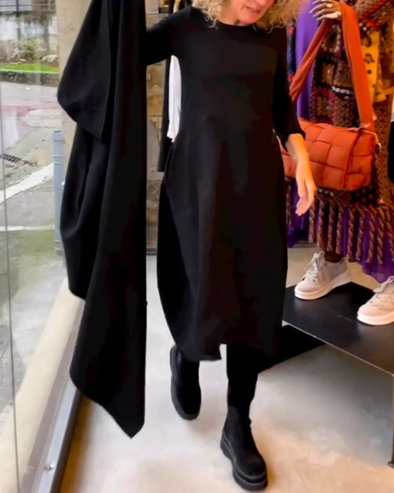 elegante-jurk-in-een-effen-kleur-zwart-deqalli.jpg