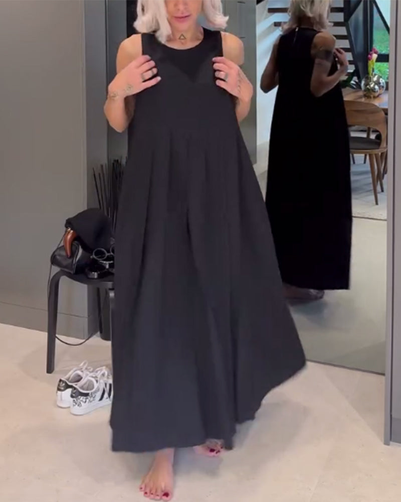 Elegante mouwloze jurk in effen kleur met een omslag in de kleur Zwart voor dames in stijl ideaal voor de lente.