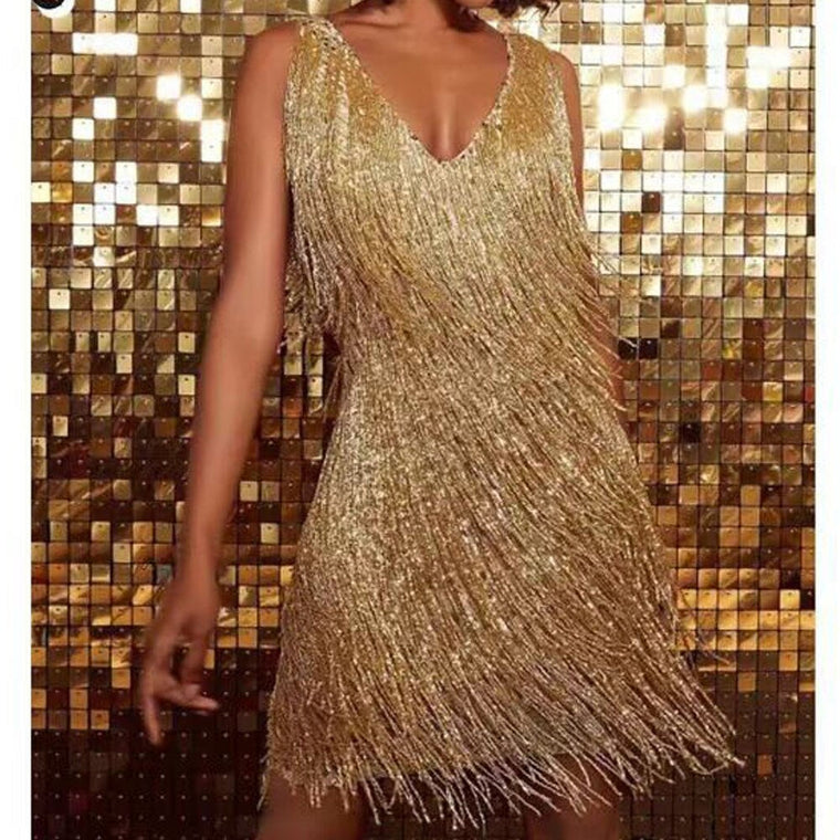 Elin | Sprankelende kwastjesjurk zonder mouwen in de kleur Goud voor dames in Party stijl ideaal voor de lente.