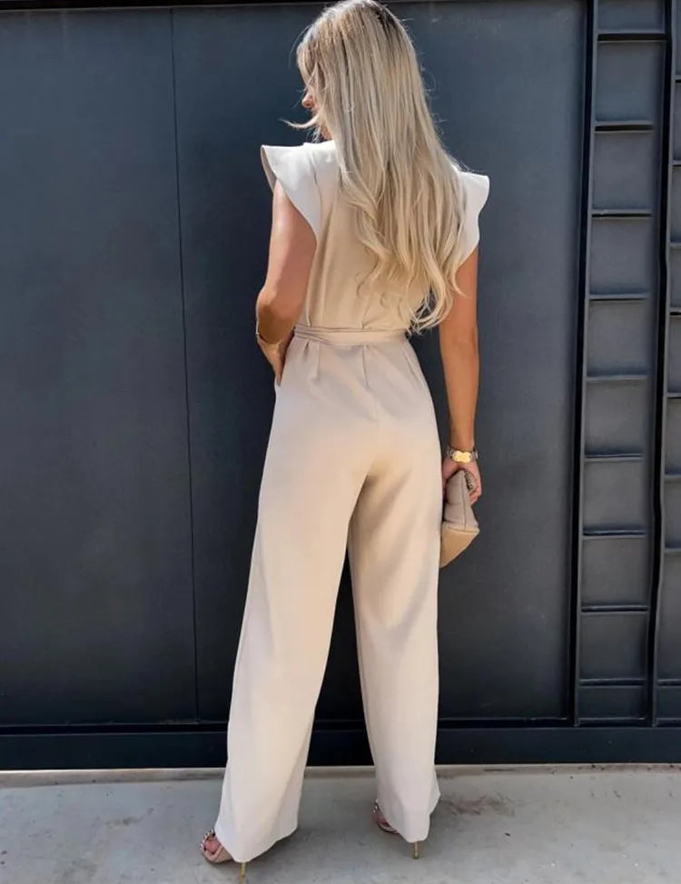 Deze jumpsuit combineert stijl, comfort en speelsheid met prachtige ruches mouwen en een ceintuur voor een flatterende en trendy uitstraling, geschikt voor diverse gelegenheden. Gemaakt van hoogwaardige materialen en veelzijdig inzetbaar voor zowel formele als informele events. Maattabel beschikbaar voor diverse EU-maten.