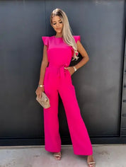Deze jumpsuit combineert stijl, comfort en speelsheid met prachtige ruches mouwen en een ceintuur voor een flatterende en trendy uitstraling, geschikt voor diverse gelegenheden. Gemaakt van hoogwaardige materialen en veelzijdig inzetbaar voor zowel formele als informele events. Maattabel beschikbaar voor diverse EU-maten.