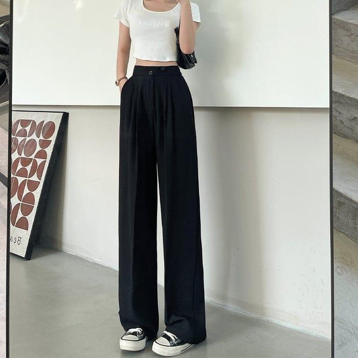 Elke | Brede stijlvolle pantalon in de kleur Zwart voor dames in Formal stijl ideaal voor de lente.