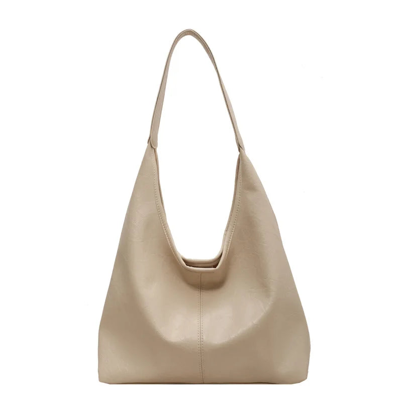 Emma | Grote leren schoudertas voor dames in de kleur Wit voor dames in stijl geschikt voor alle seizoenen.