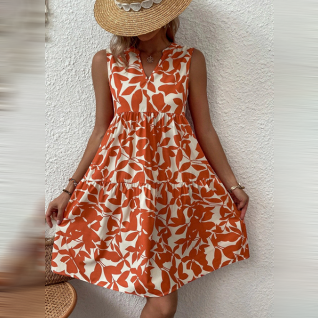 Esmée | Zomerjurk met boho uitstraling in de kleur Oranje voor dames in stijl ideaal voor de zomer.