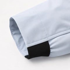 Windjack met capuchon en ritszakken