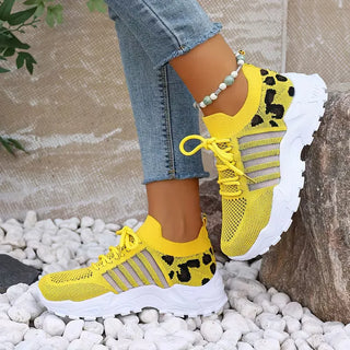 Lage sneaker met leopard print