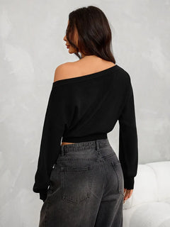 Oversized trui met asymmetrische hals