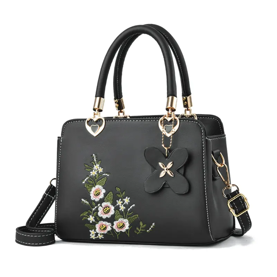 Flora Crossbody Tas | Met prachtig borduursel in de kleur Zwart voor dames in stijl geschikt voor alle seizoenen.