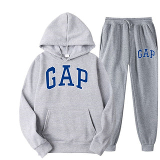 Dames joggingpak - een perfecte combinatie van modern design en ultiem comfort. Gemaakt van comfortabel materiaal dat zweet absorbeert en sneldrogend is, ideaal voor zowel sportieve activiteiten als ontspanning thuis.
