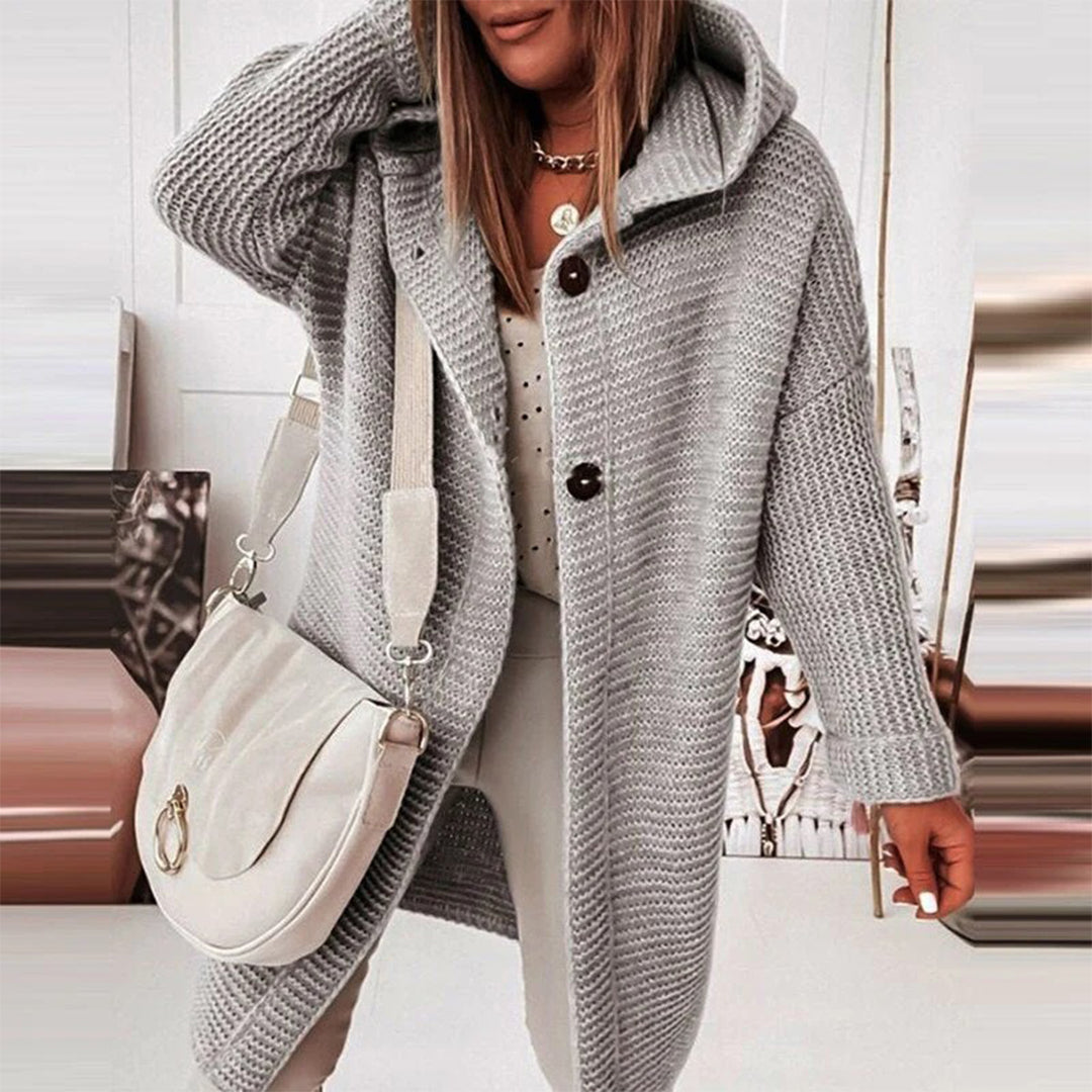 Gebreid vest met knoopjes en capuchon in de kleur Grijs voor dames in stijl ideaal voor de herfst.