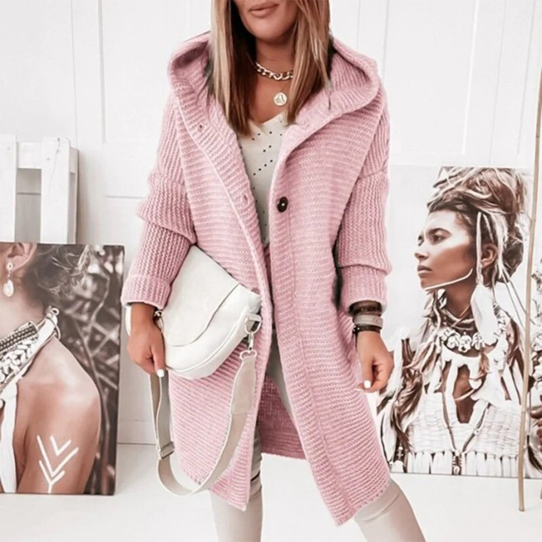 Gebreid vest met knoopjes en capuchon in de kleur Lichtroze voor dames in stijl ideaal voor de herfst.