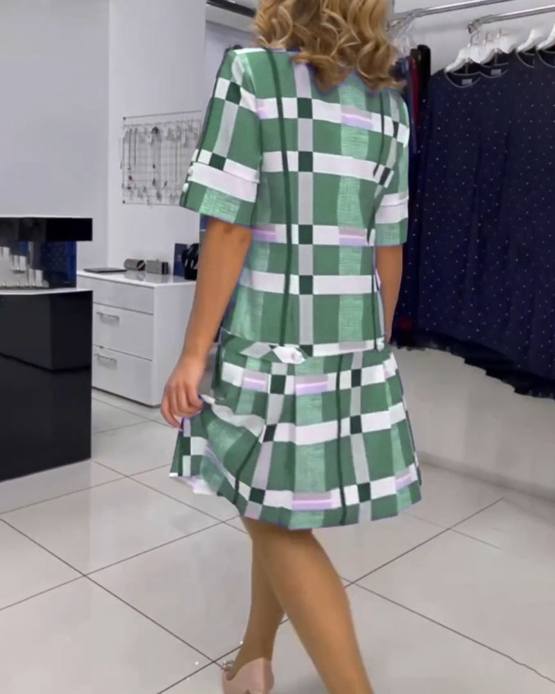 Geruite jurk met ronde hals in de kleur Roze voor dames in stijl ideaal voor de lente.