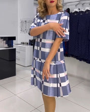 Geruite jurk met ronde hals in de kleur Roze voor dames in stijl ideaal voor de lente.