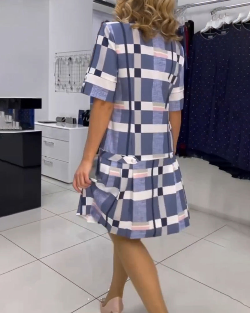 Geruite jurk met ronde hals in de kleur Roze voor dames in stijl ideaal voor de lente.