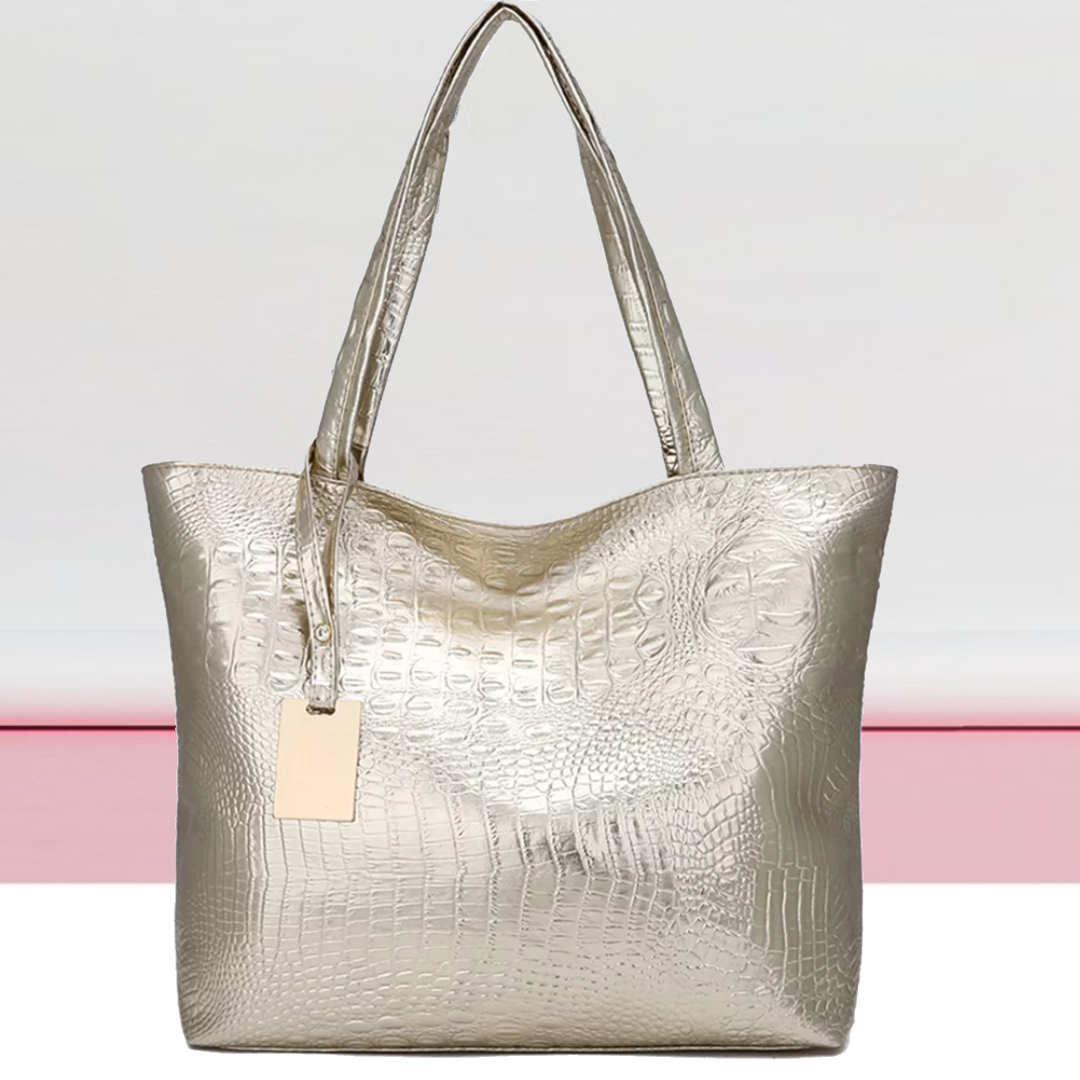 Isabella Schoudertas | Ruime tas met krokodillenprint in de kleur Goud voor dames in stijl geschikt voor alle seizoenen.