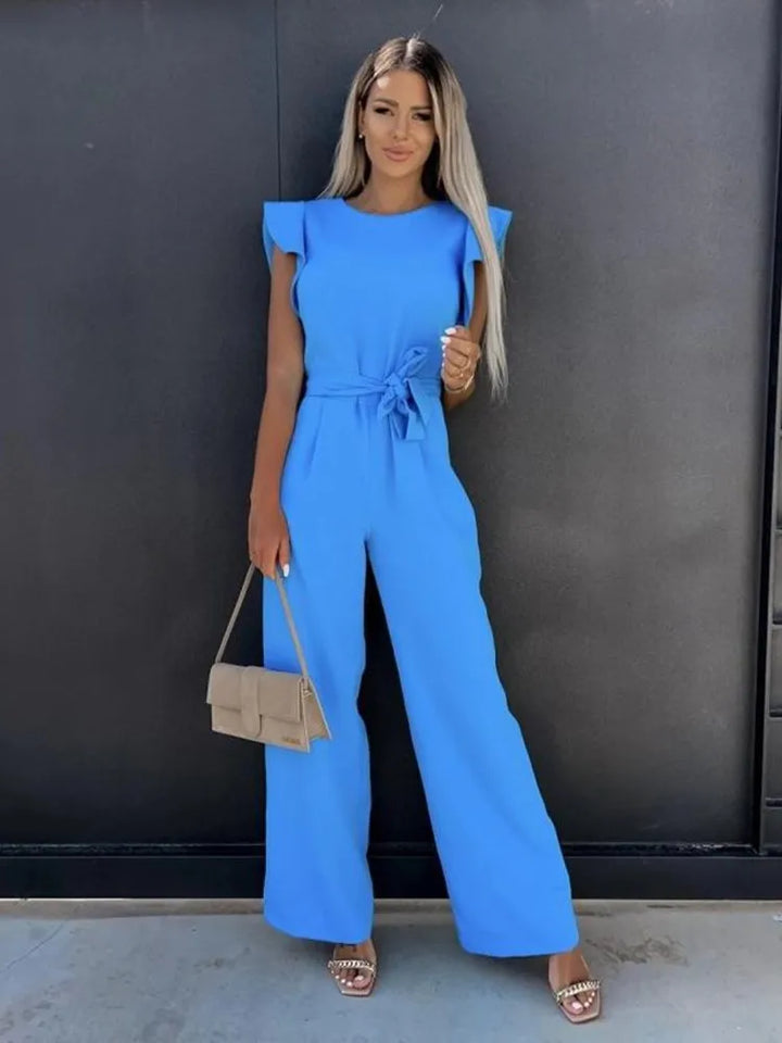 Ultieme elegantie - deze jumpsuit is een stijlvolle keuze met prachtige wijde pijpen voor een trendy uitstraling. Kenmerken zijn onder andere een ronde halslijn, lichte rekbaarheid voor comfort en een perfecte pasvorm die flatteert.