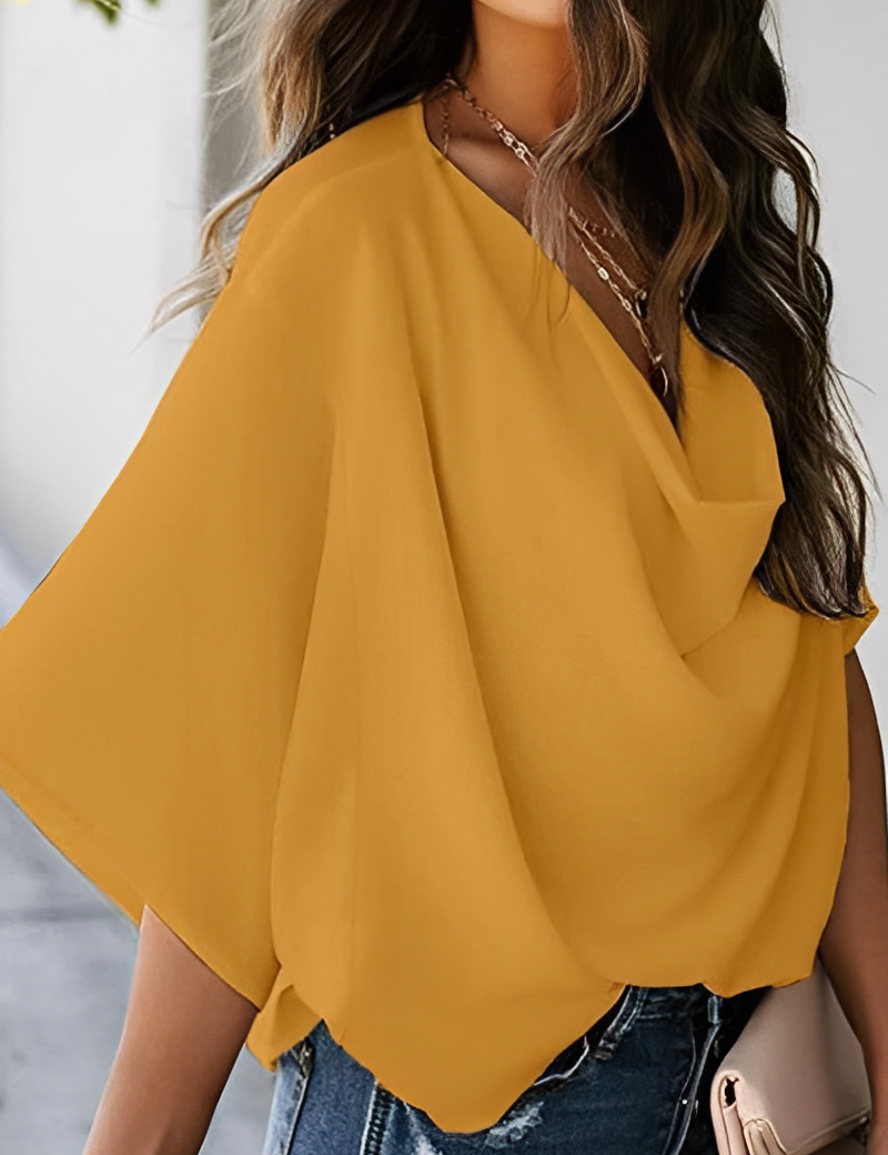Casual zomer chiffon blouse - ervaar ultiem comfort en moeiteloze elegantie met deze blouse, perfect voor een stijlvolle look in warm weer. Gemaakt van luchtige chiffonstof voor een verkoelend effect, en voorzien van een relaxte pasvorm, lichte mouwen en vrouwelijke details zoals een V-hals. De veelzijdige stijl maakt deze blouse geschikt voor diverse gelegenheden. Maattabel beschikbaar voor S, M, L en XL.