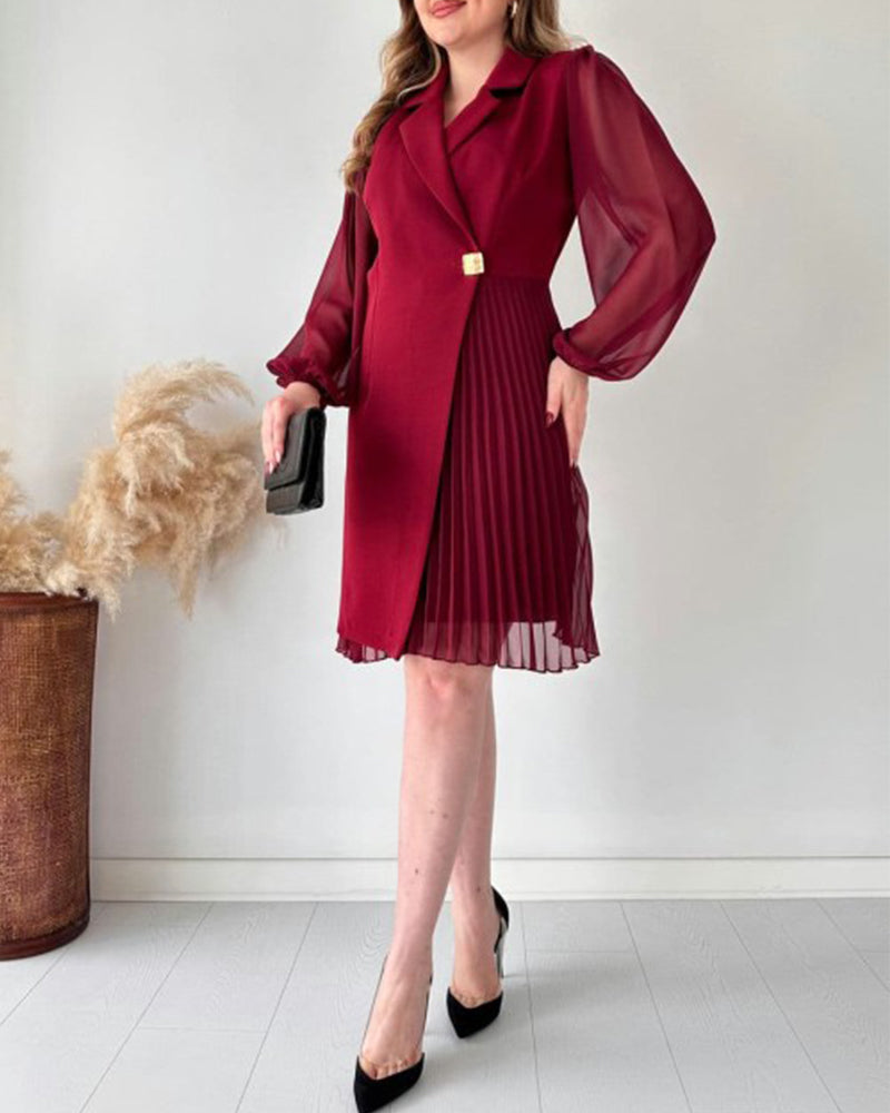 Jurk met gouden gesp in de kleur Zwart voor dames in stijl ideaal voor de herfst.