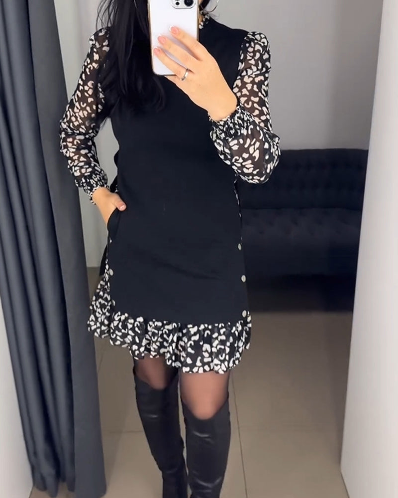 Jurk met patchworkzak en print in de kleur Zwart voor dames in stijl ideaal voor de herfst.