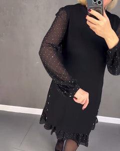 Langarmige elegante jurk met stippen in de kleur Zwart voor dames in stijl ideaal voor de herfst.