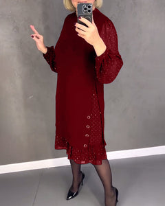 Langarmige elegante jurk met stippen in de kleur Zwart voor dames in stijl ideaal voor de herfst.
