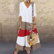 Lange jurk met elegante uitstraling in de kleur Wit voor dames in stijl ideaal voor de lente.