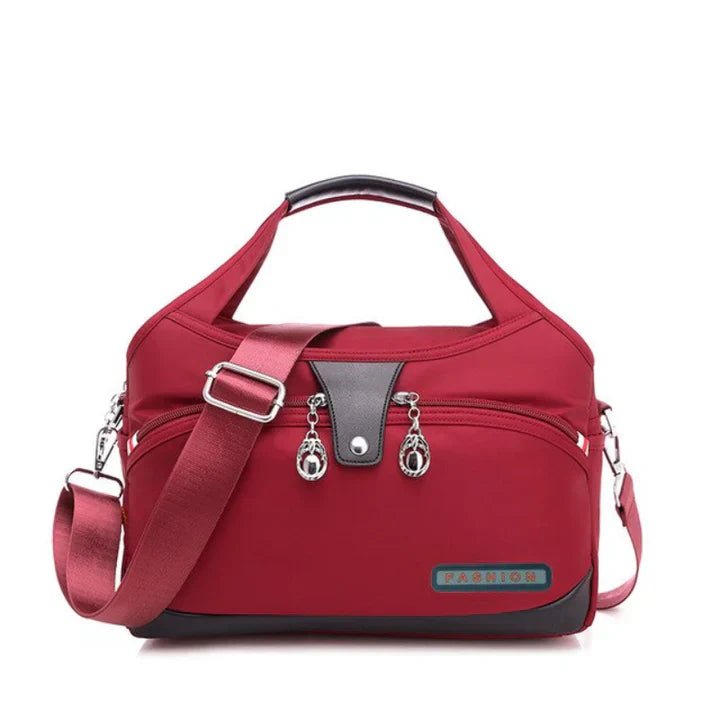 Lara | Stijlvolle anti-diefstal handtas in de kleur Rood voor dames in stijl geschikt voor alle seizoenen.