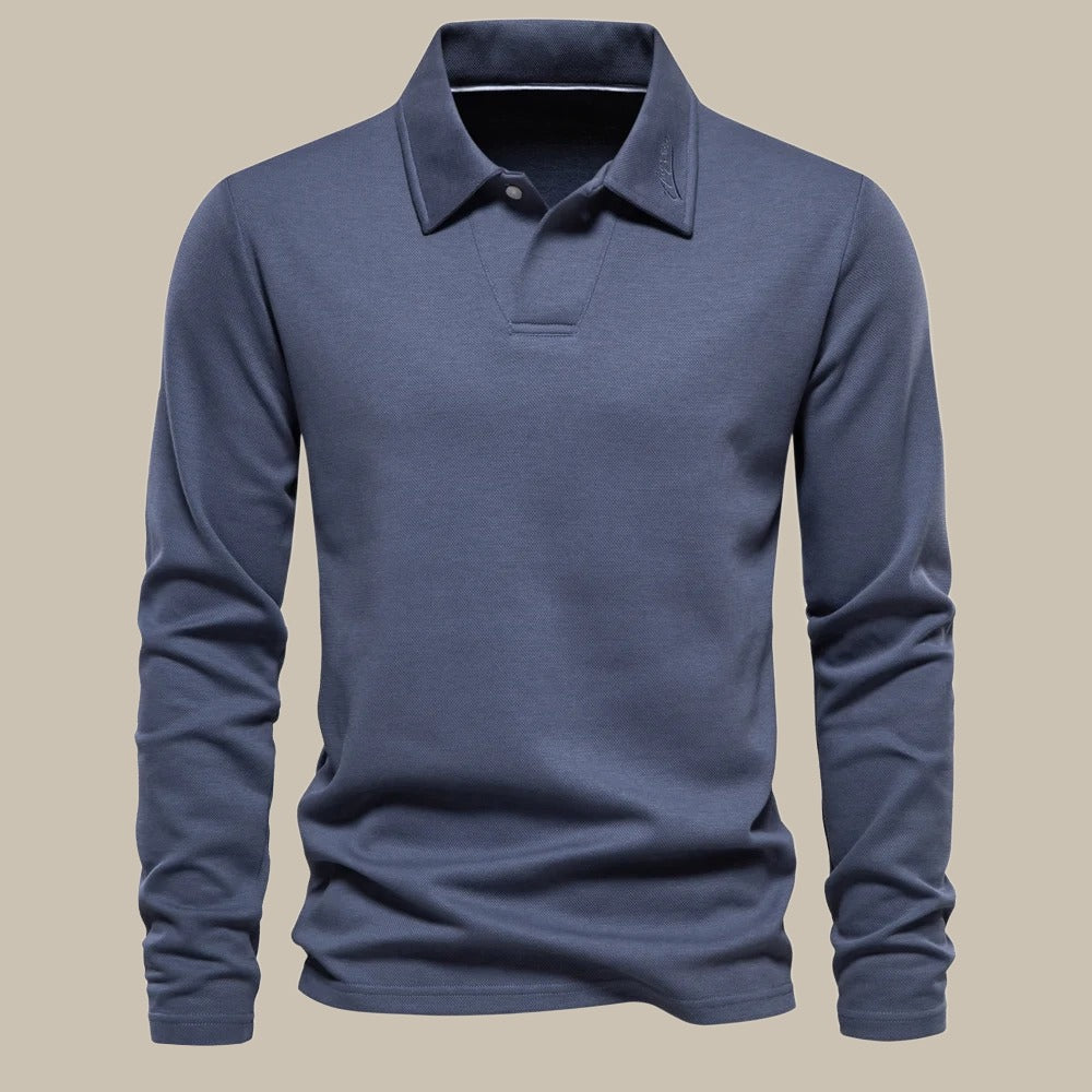 Stijlvolle lange mouw polo voor heren, ontworpen met aandacht voor detail voor een tijdloze uitstraling, ultiem comfort en veelzijdigheid. Perfect om je uitstraling te versterken.