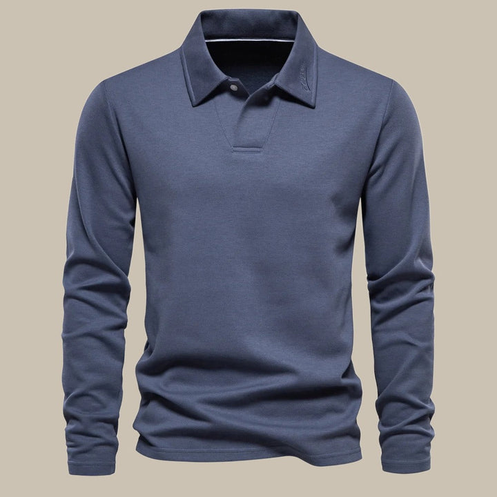 Stijlvolle lange mouw polo voor heren, ontworpen met aandacht voor detail voor een tijdloze uitstraling, ultiem comfort en veelzijdigheid. Perfect om je uitstraling te versterken.