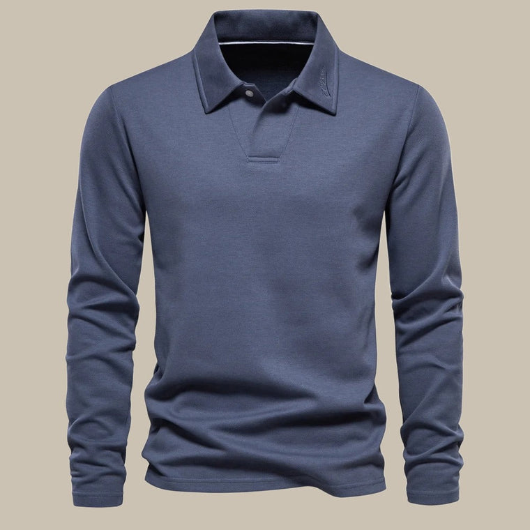 Stijlvolle lange mouw polo voor heren, ontworpen met aandacht voor detail voor een tijdloze uitstraling, ultiem comfort en veelzijdigheid. Perfect om je uitstraling te versterken.