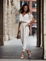 Stijlvolle Witte Jumpsuit met Open Schouders - Veelzijdig en Modieus