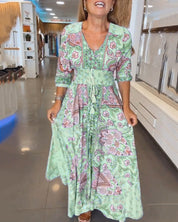 Leuke V-hals Jurk met print en A-lijn in de kleur Blauw voor dames in stijl ideaal voor de lente.