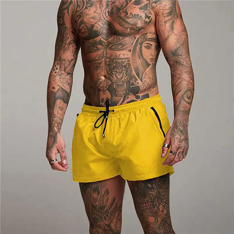 Liam Swim Trunks | Upgrade je zomerstijl met onze must-have zwembroek in de kleur Geel voor heren in Beach stijl ideaal voor de zomer.