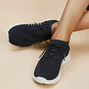 Lichtgewicht ademende orthopedische hardloopschoenen in de kleur Zwart voor dames in stijl geschikt voor alle seizoenen.