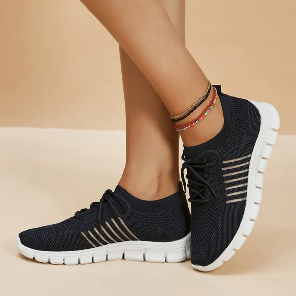 Lichtgewicht ademende orthopedische hardloopschoenen in de kleur Zwart voor dames in stijl geschikt voor alle seizoenen.