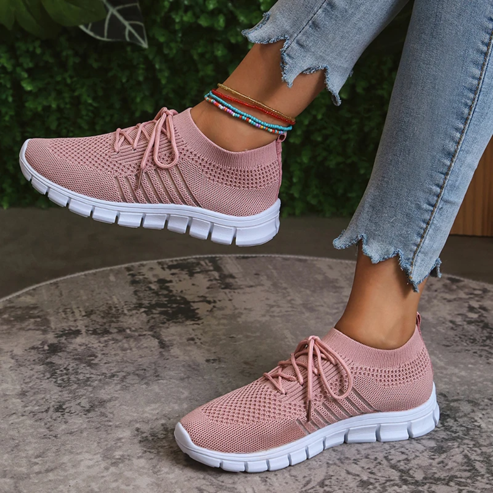 Lichtgewicht ademende orthopedische hardloopschoenen in de kleur Roze voor dames in stijl geschikt voor alle seizoenen.