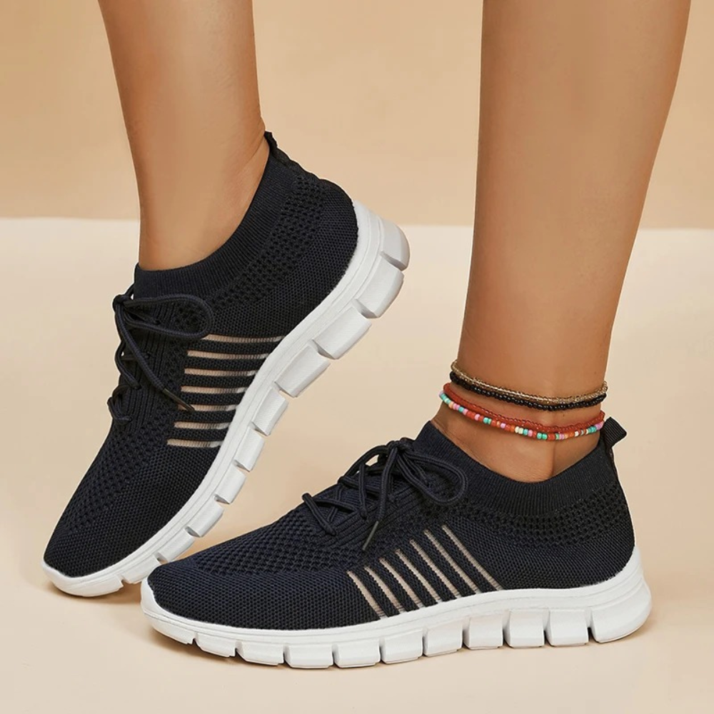 Lichtgewicht ademende orthopedische hardloopschoenen in de kleur Zwart voor dames in stijl geschikt voor alle seizoenen.