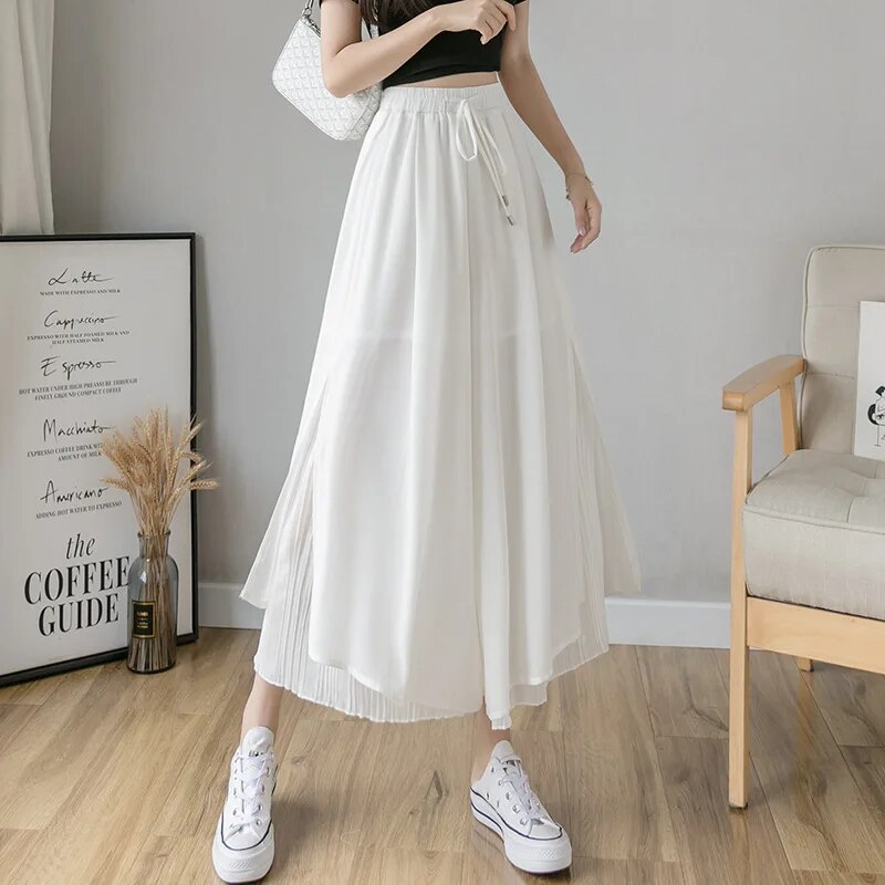 Lise | Vrouwen hoge taille chiffon rok met plooien in de kleur Wit voor in stijl ideaal voor de lente.