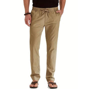 Loose fit broek met elastische band in de kleur Beige voor dames in stijl geschikt voor alle seizoenen.
