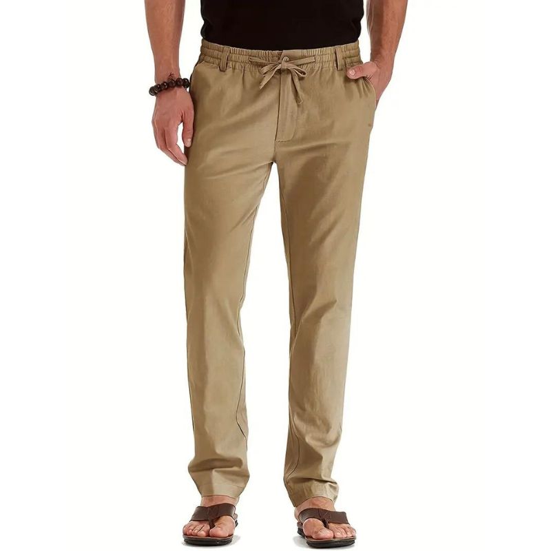 Loose fit broek met elastische band in de kleur Beige voor dames in stijl geschikt voor alle seizoenen.