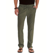 Loose fit broek met elastische band in de kleur Legergroen voor dames in stijl geschikt voor alle seizoenen.