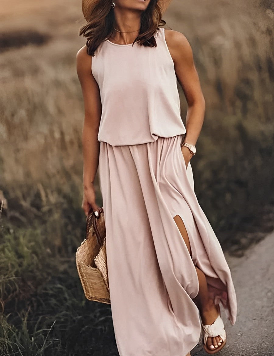 Deze maxi-jurk straalt een elegante en kleurrijke stijl uit, ideaal voor diverse gelegenheden. Met een vleugje retrostijl biedt deze jurk zowel comfort als trendy uitstraling. Mouwloos ontwerp voor zomerse elegantie, in hoogwaardige en duurzame materialen voor een comfortabele pasvorm.